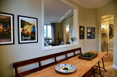 Area soggiorno di La Croce d'Oro Santa Croce Suite Apartments