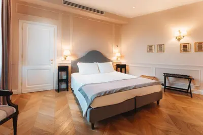Letto o letti in una camera di La Croce d'Oro Santa Croce Suite Apartments