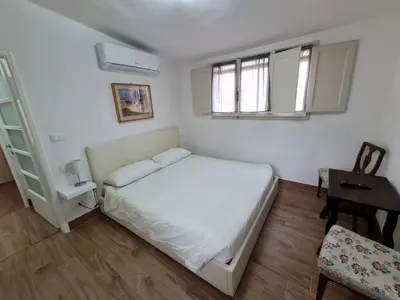 Letto o letti in una camera di Vista su Palazzo Vecchio