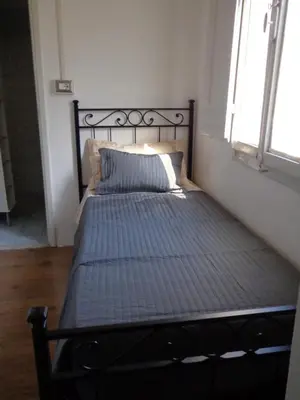 Letto o letti in una camera di Vista su Palazzo Vecchio