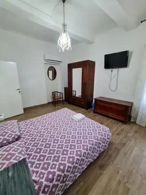 Letto o letti in una camera di Vista su Palazzo Vecchio