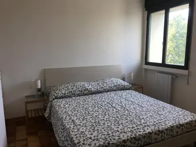 Letto o letti in una camera di Casa Piave
