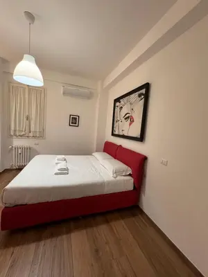 Letto o letti in una camera di Il Violino