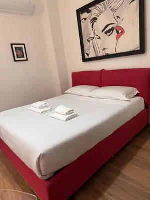 Letto o letti in una camera di Il Violino