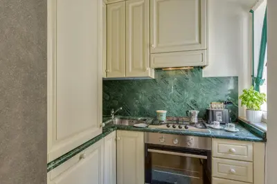 Cucina o angolo cottura di Apartments Florence - Benedetto Duomo
