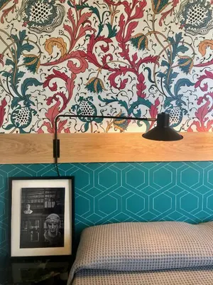 Letto o letti in una camera di Ostello Tasso