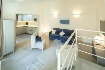 Letto o letti in una camera di Carapelli Apartments