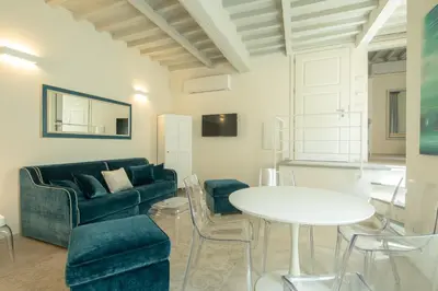 Area soggiorno di Carapelli Apartments