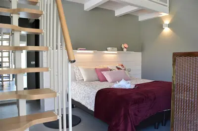 Letto o letti in una camera di L'ALBEROCASA Eco Residence