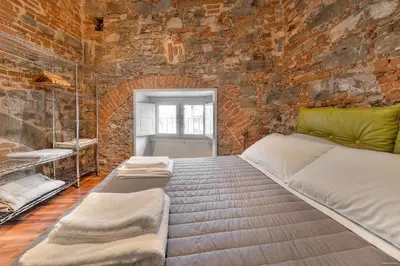 Letto o letti in una camera di Stone Walls Deluxe