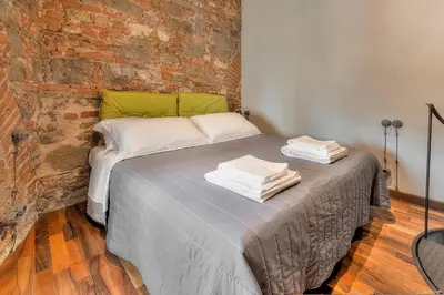 Letto o letti in una camera di Stone Walls Deluxe