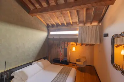 Letto o letti in una camera di Residenza d'Epoca Visacci Valori Rooftop