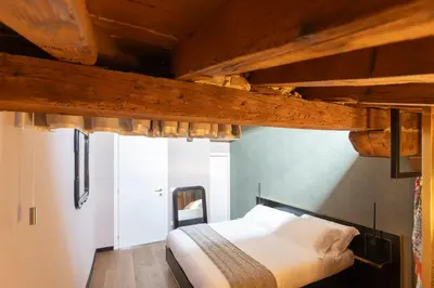 Letto o letti in una camera di Residenza d'Epoca Visacci Valori Rooftop