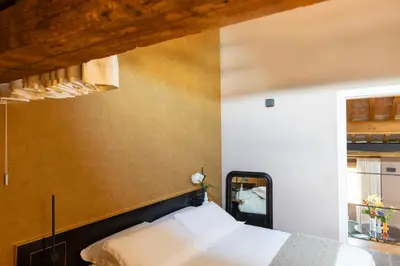 Letto o letti in una camera di Residenza d'Epoca Visacci Valori Rooftop