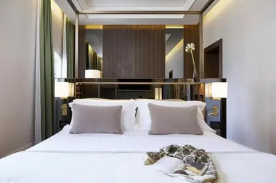 Letto o letti in una camera di Messori Suites
