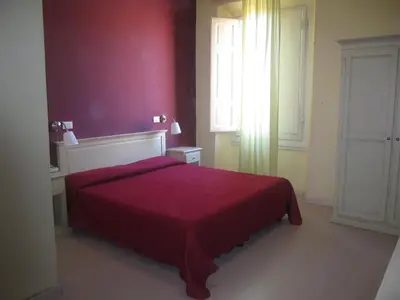 Letto o letti in una camera di Hotel Genzianella