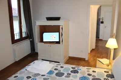 TV o dispositivi per l'intrattenimento presso San Lorenzo Central Market Cozy & Quiet Apartment