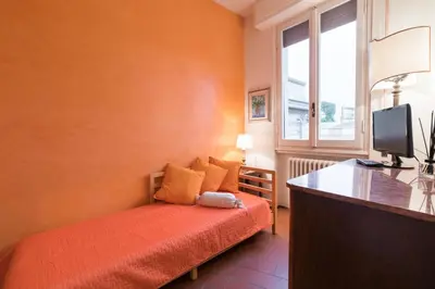 Letto o letti in una camera di Roommo Savonarola