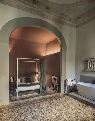 Letto o letti in una camera di Casa Botticelli