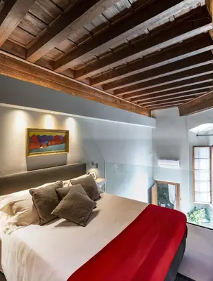 Letto o letti in una camera di Casa Botticelli