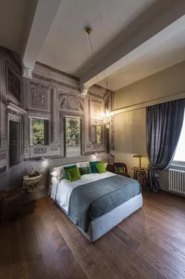 Letto o letti in una camera di Casa Botticelli