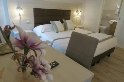 Letto o letti in una camera di Elisa Guest House