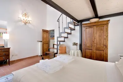 Letto o letti in una camera di Corte al Duomo by Mmega