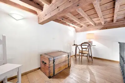 Letto o letti in una camera di Corte al Duomo by Mmega