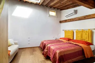 Letto o letti in una camera di Appartamento In Via Giuseppe Verdi