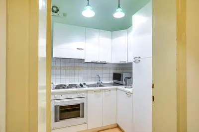 Cucina o angolo cottura di Palazzo Spinelli Apartment by Mamo Florence