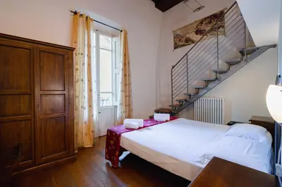 Letto o letti in una camera di Piazza Dei Ciompi With Private Garden