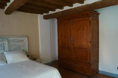 Letto o letti in una camera di Casa Leopoldo