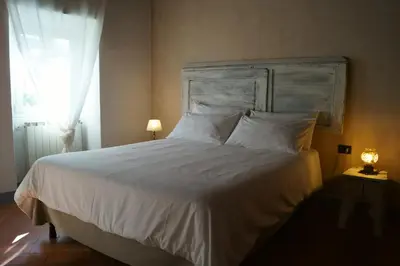 Letto o letti in una camera di Casa Leopoldo