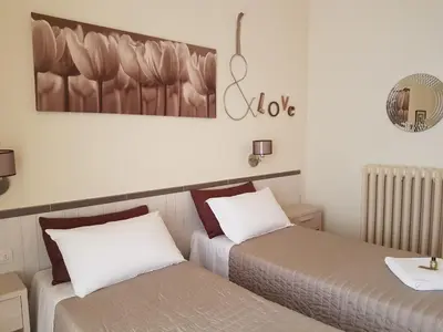 Letto o letti in una camera di Villa Alle Rampe