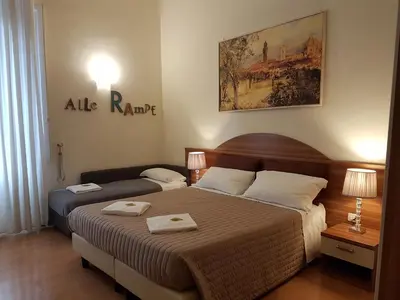 Letto o letti in una camera di Villa Alle Rampe