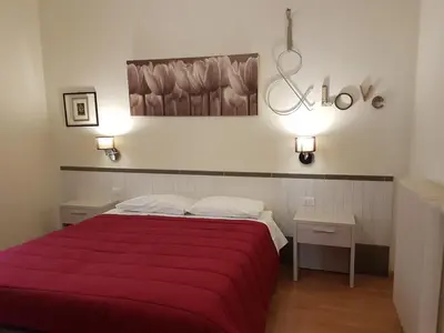 Letto o letti in una camera di Villa Alle Rampe