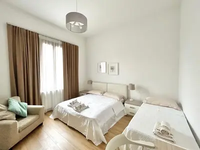 Letto o letti in una camera di Le Tre Orchidee Florence