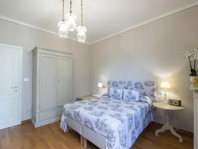 Letto o letti in una camera di Your Florence