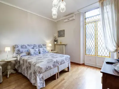 Letto o letti in una camera di Your Florence