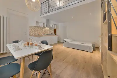 Area soggiorno di Sarpi Loft Florence