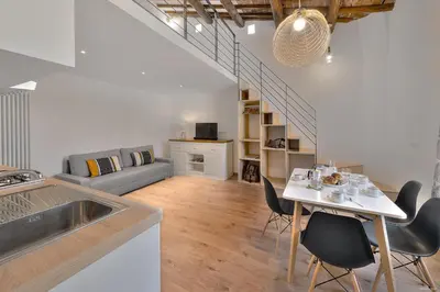 Area soggiorno di Sarpi Loft Florence