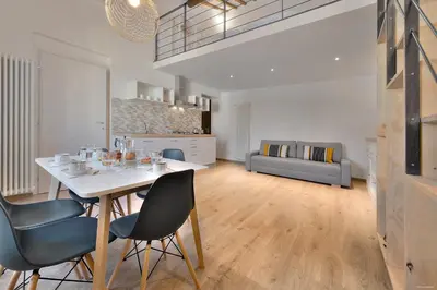 Area soggiorno di Sarpi Loft Florence