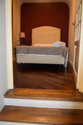 Letto o letti in una camera di Soggiorno La Cupola Guesthouse