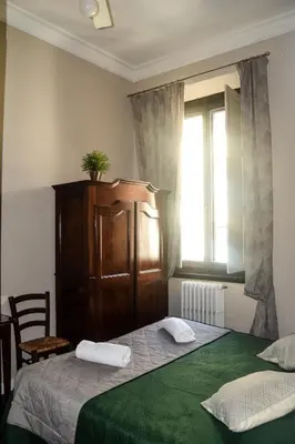 Letto o letti in una camera di Soggiorno La Cupola Guesthouse