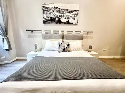 Letto o letti in una camera di Silver Novella Luxury Apartment - Centro Storico