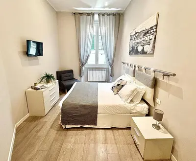 Letto o letti in una camera di Silver Novella Luxury Apartment - Centro Storico