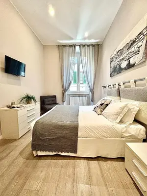 Letto o letti in una camera di Silver Novella Luxury Apartment - Centro Storico