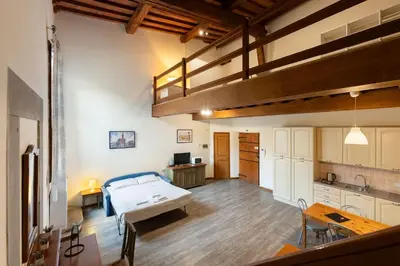 Letto o letti in una camera di Apartments close to Duomo