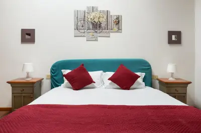 Letto o letti in una camera di Apartments close to Duomo