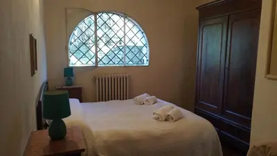 Letto o letti in una camera di La Cascianella